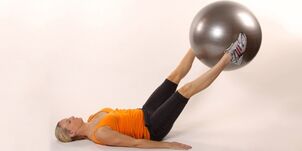 Catching a gymnastic ball between the raised legs develops a lower press