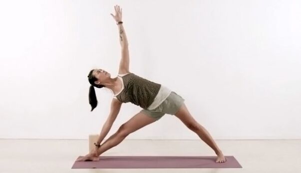 Yoga triangle posture for weight loss